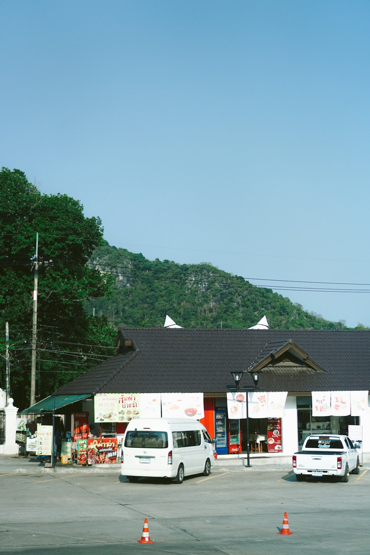 a white van parked in front of a store