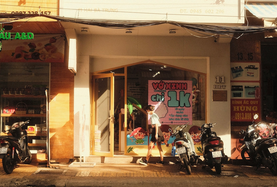 a group of motorcycles parked in front of a store