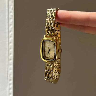 Montre ancienne en or pour femme