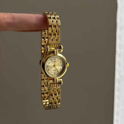 Montre ancienne en or pour femme